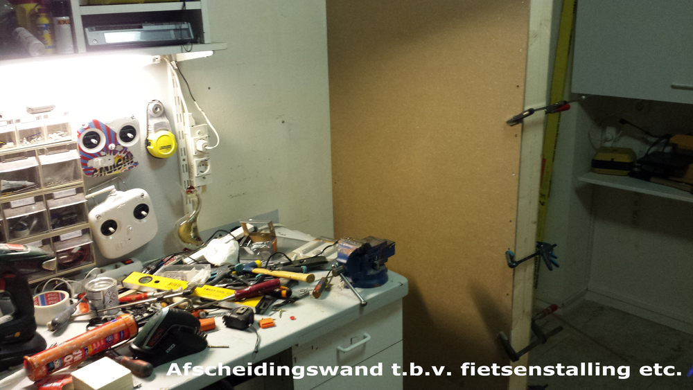 Opbouw afscheidingswand t.b.v. fiets etc.